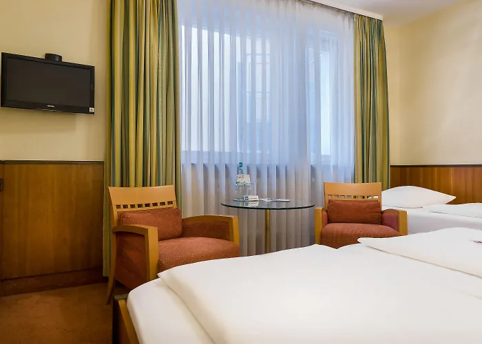 Plaza Rieker Hauptbahnhof Штутгарт