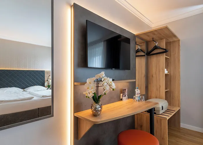 Отель Plaza Rieker Hauptbahnhof 3*